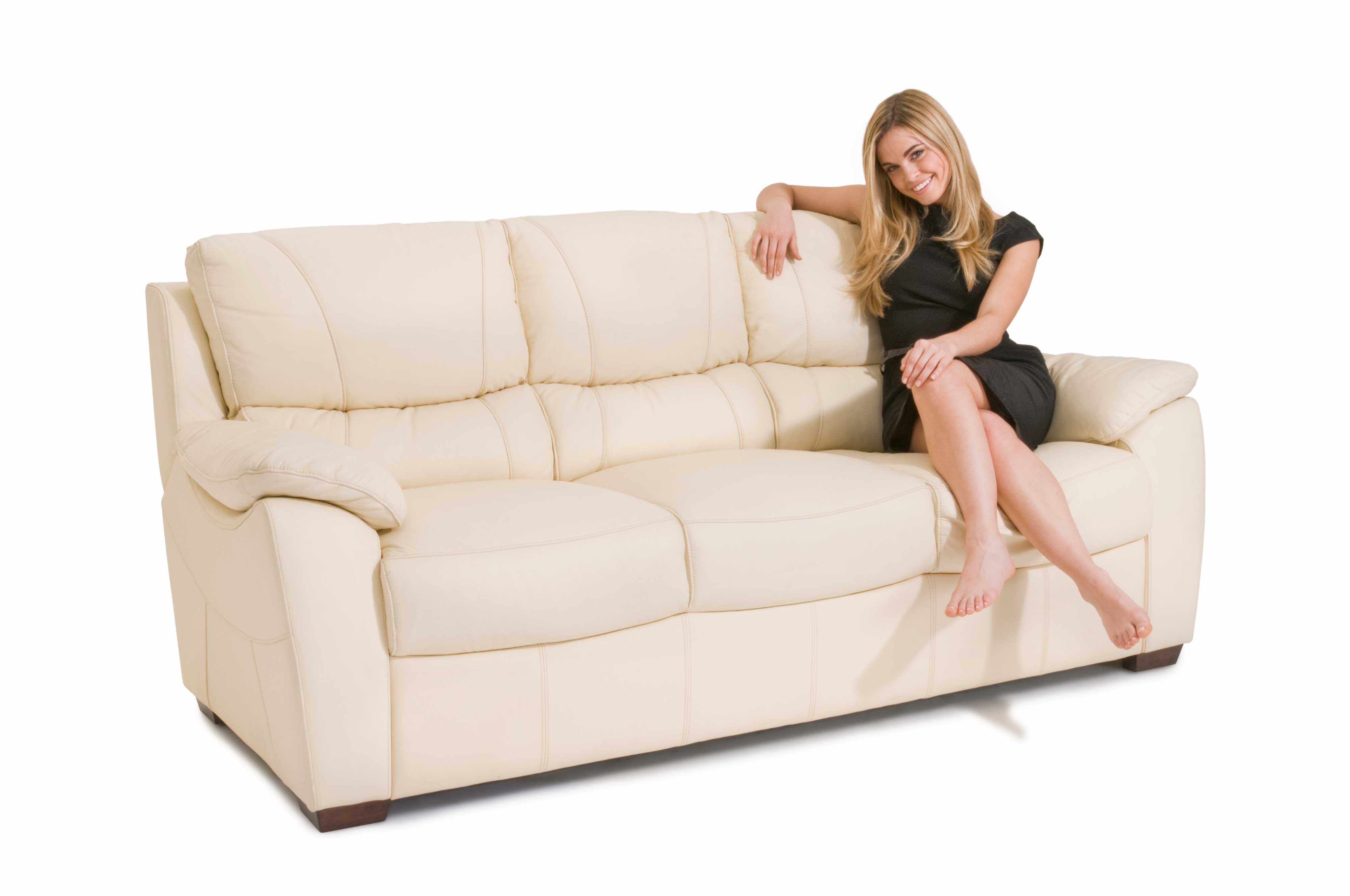 Girl sitting on a sofa for furniture advertising