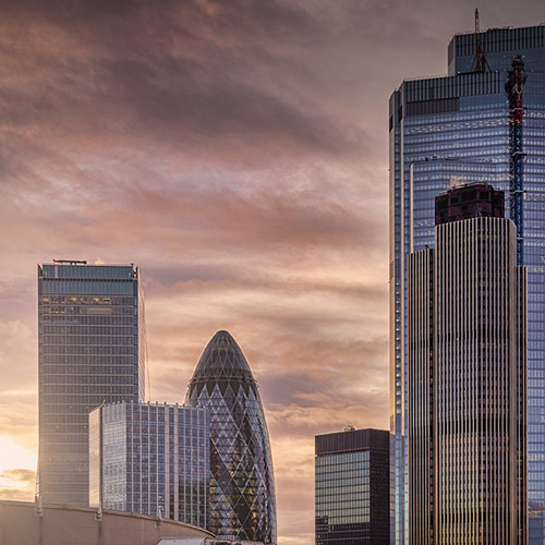 Some of London's iconic buildings against a dramatic sky