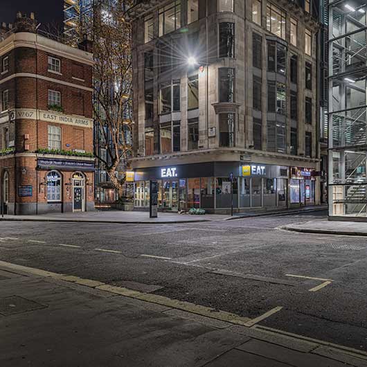 A deserted street in London photographed at night