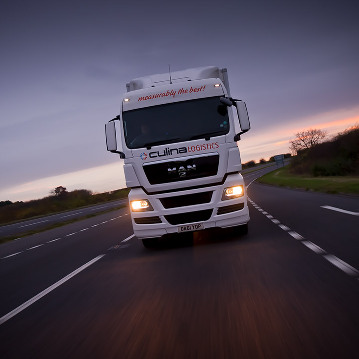 A lorry driving towards the camera.