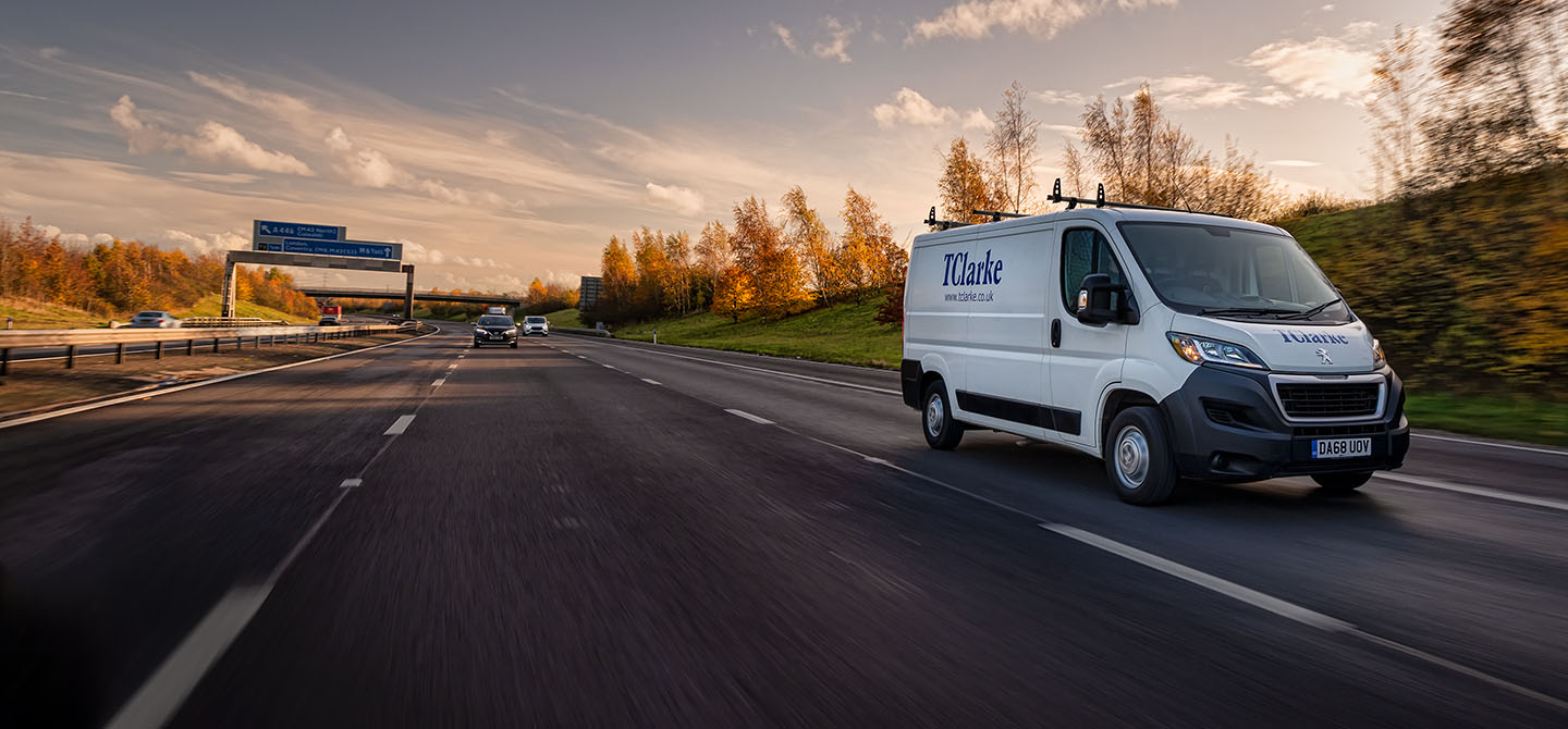 A van being driven on a motorway.