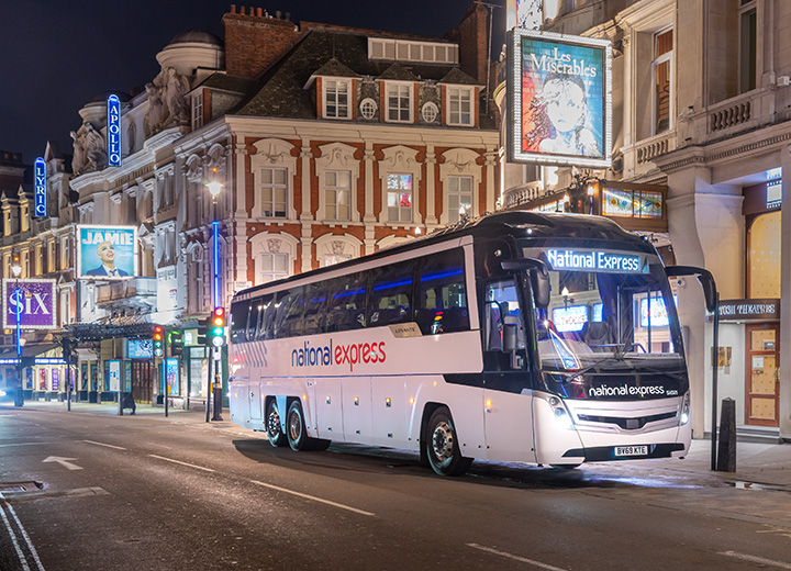 A National Express coach in the heart of the theatre area in London.