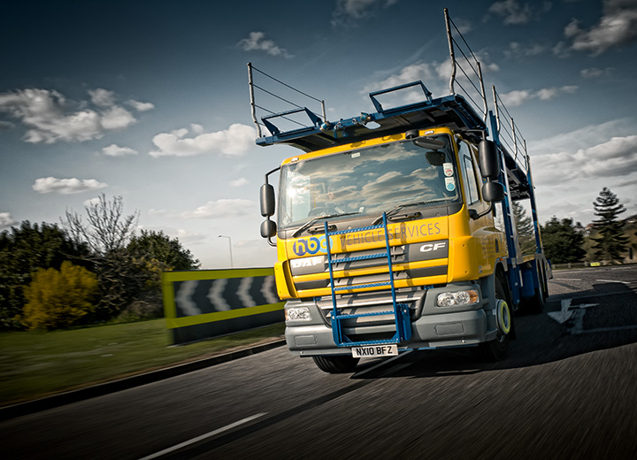 A lorry driving on a road.