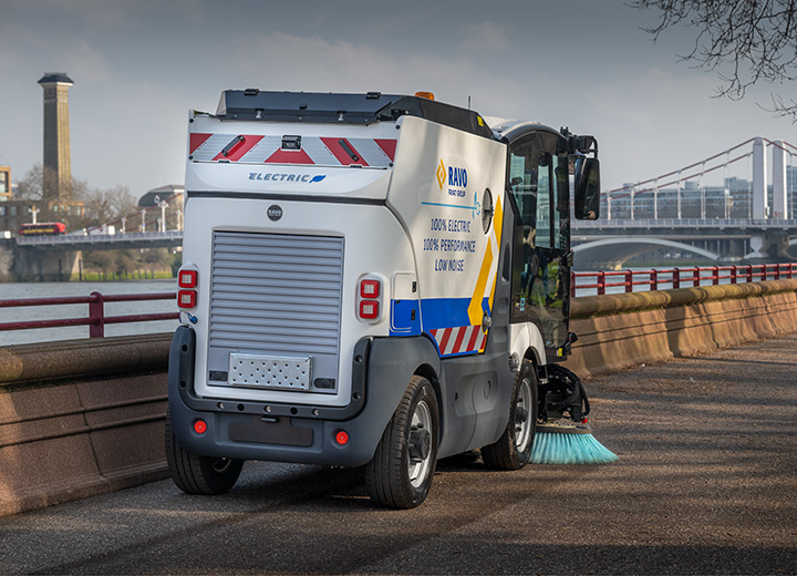 Road Sweeper cleaning a path by the Thames in London.