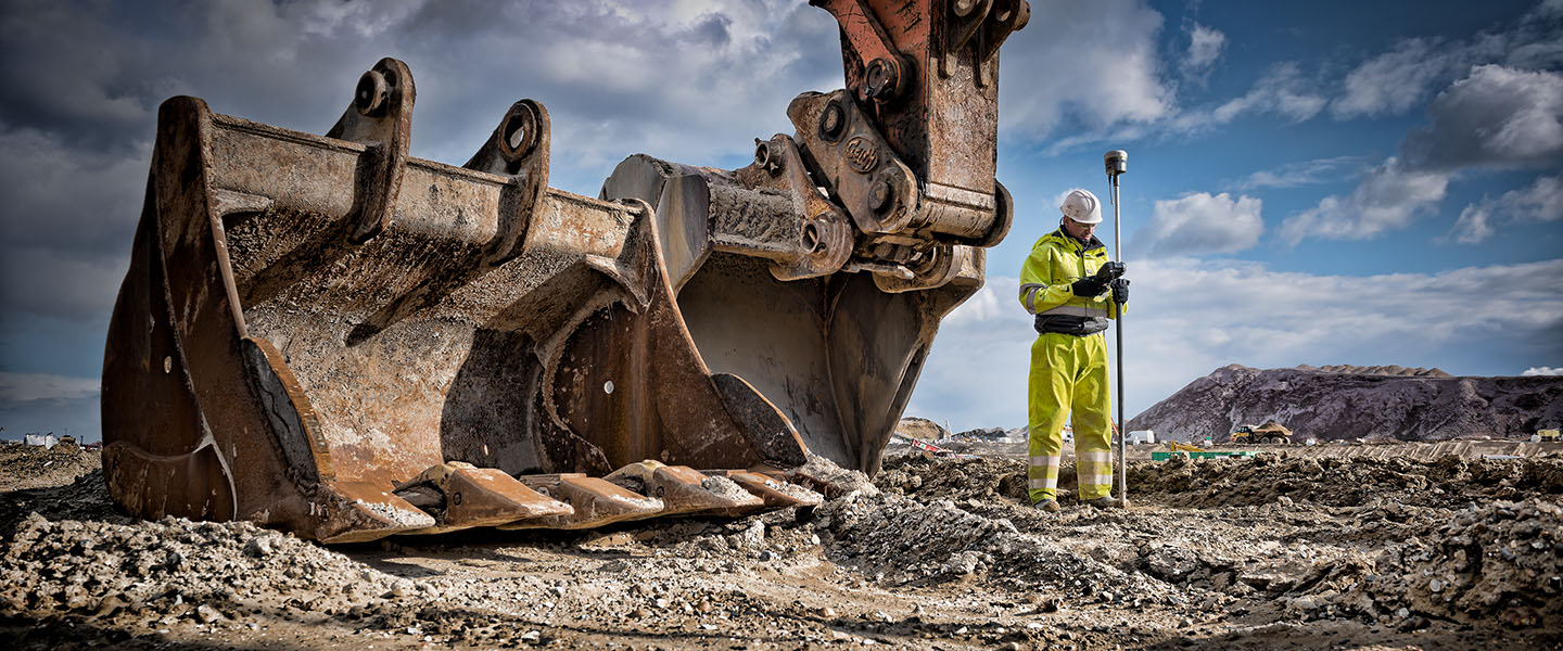 Construction photography of a worrker in Hi-viz on site in the UK