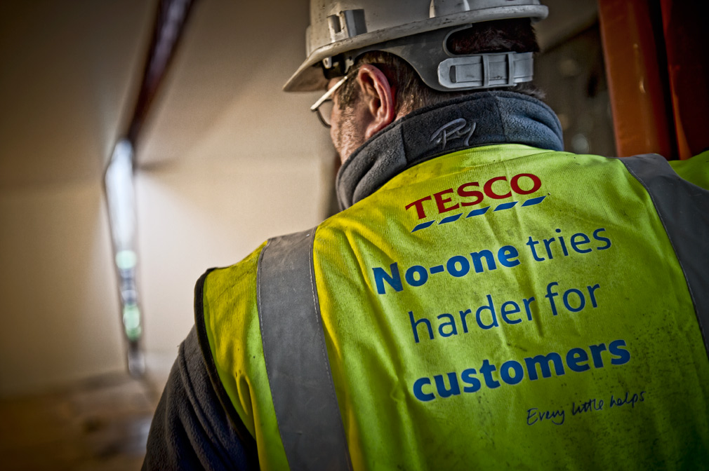 Worker in branded Hi Viz jacket