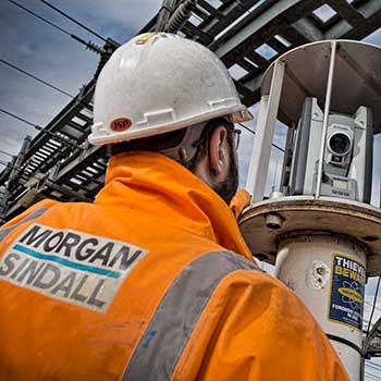 A Morgan Sindall employee working on a railway in Stratford, East London