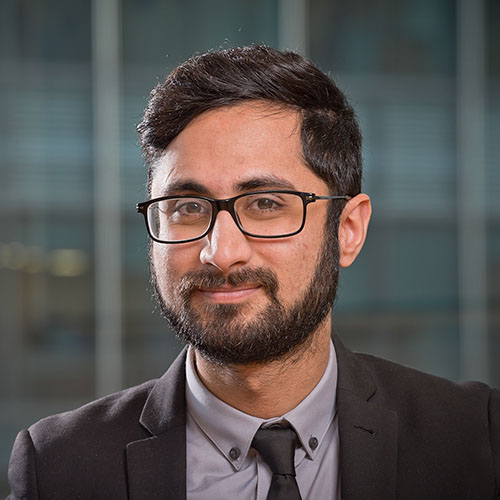 Corporate portrait of an employee in an office in Canary Wharf.