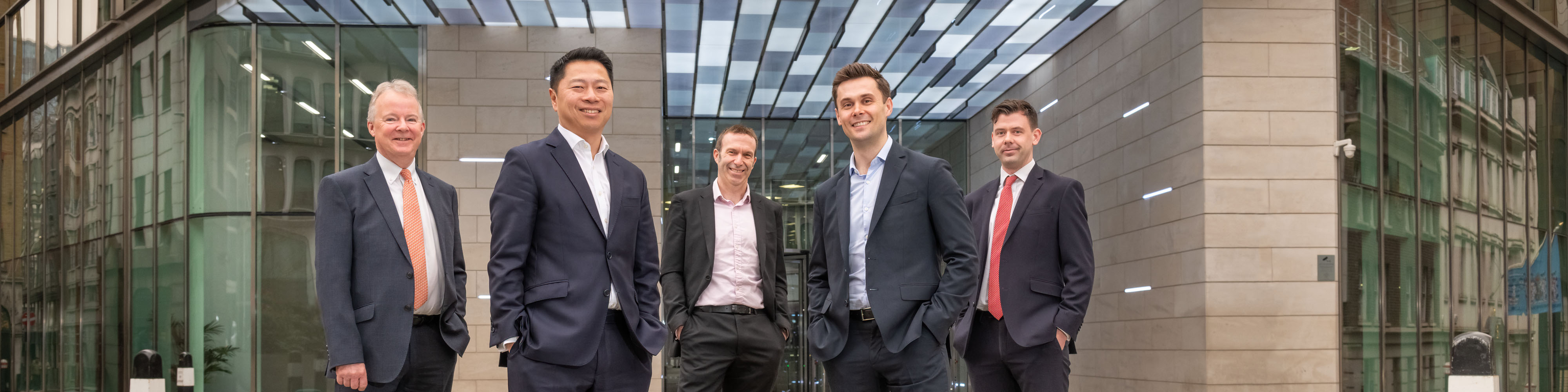Group portrait photograph of the senior management team of a FTSE 350 company in the city of London