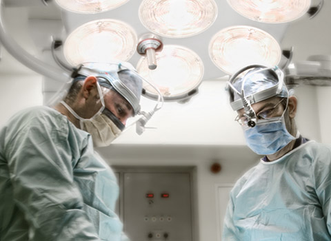 Surgeons in an operating theatre
