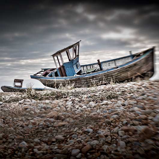 Disused boats on the beach at Dungeness