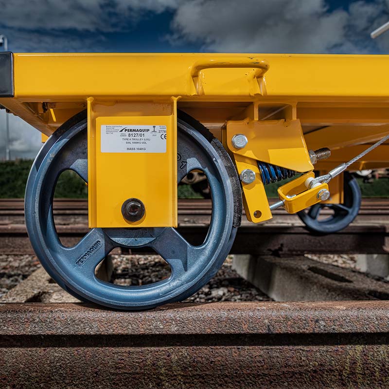 Wheel of a railway trolley on a track