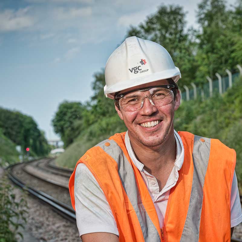 Portrait of a young worker on the railway